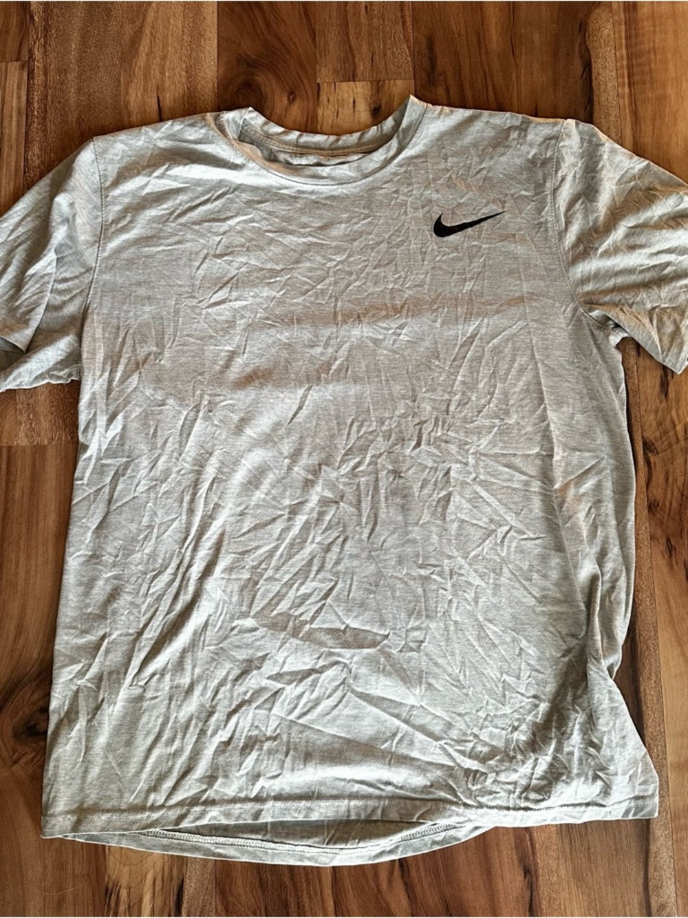 Nike Light Gray Short Sleeve Crewneck Tee with Black Swoosh